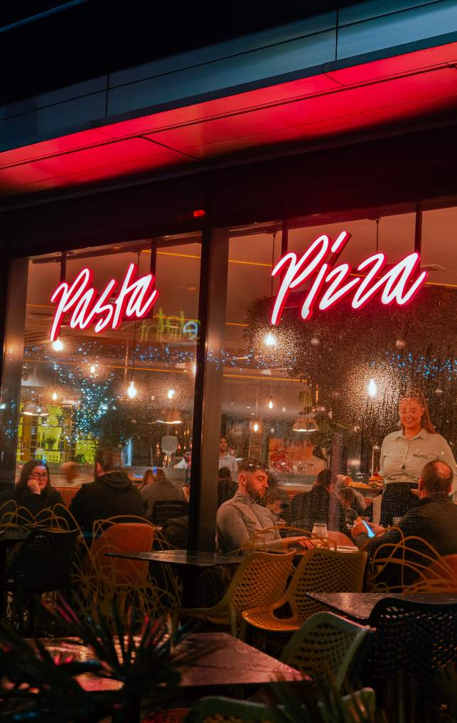 Outside view of people eating in a restaurant