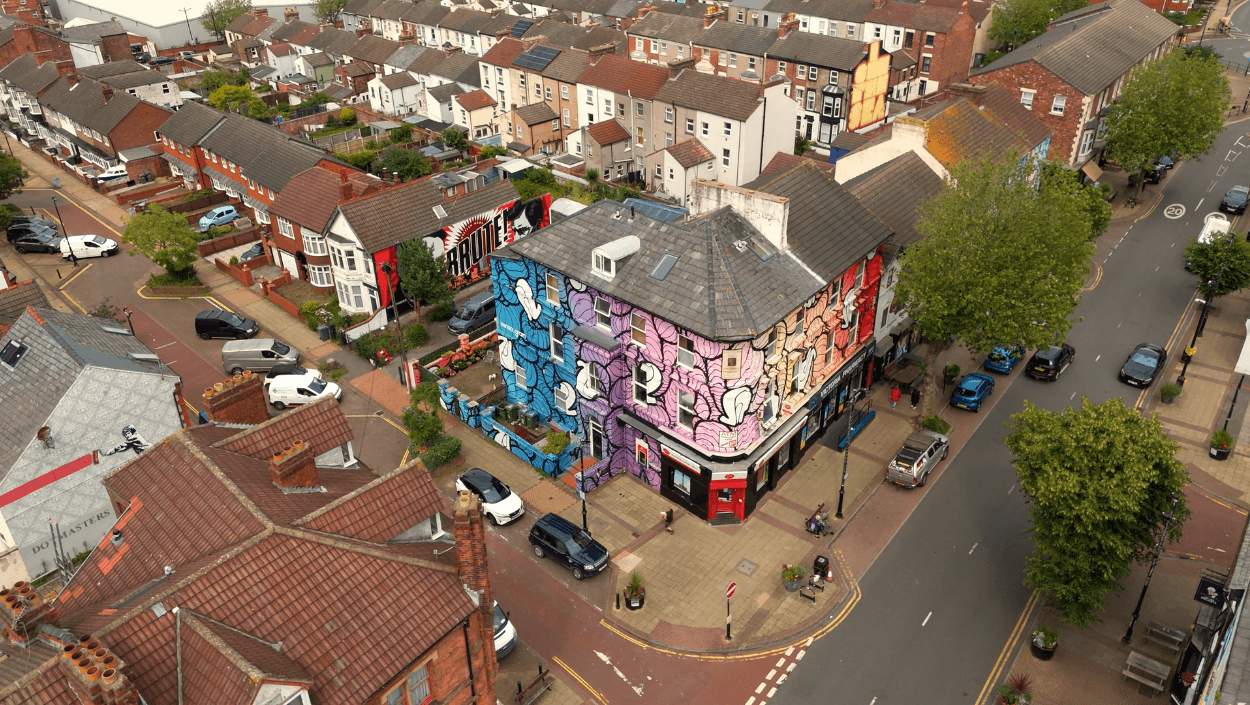 Drone view of a building in New Brighton with street art