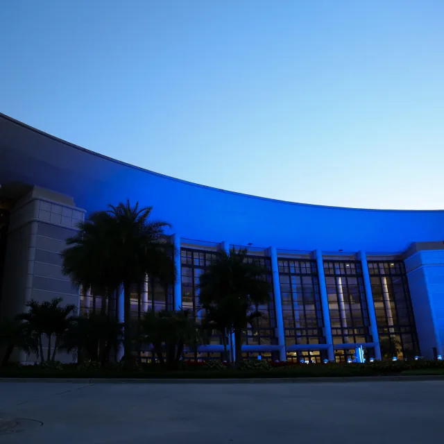 Orange County Convention Center lit up in blue