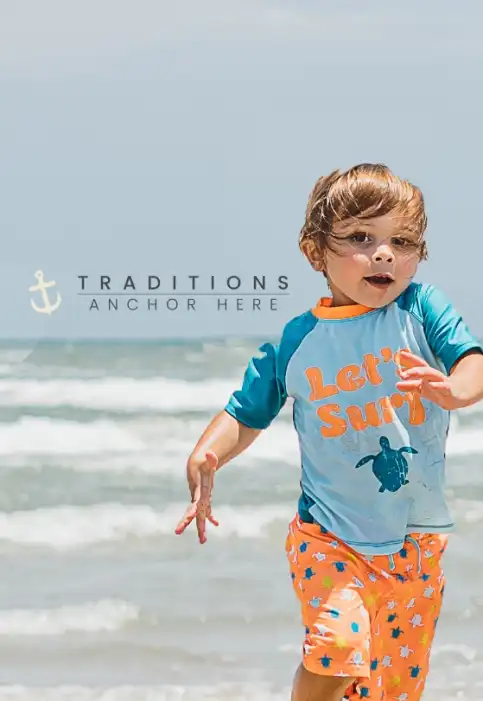 A family watches a child run across the beach in Port Aransas, Texas