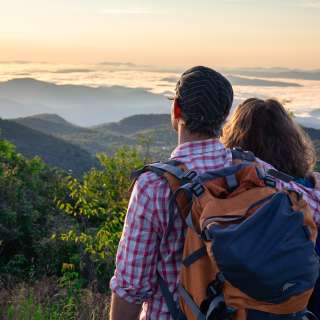 A couple enjoys a mountain vista near Asheville, NC