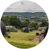 Glamping pods and campsite at Newlands Holiday Park in Dorset