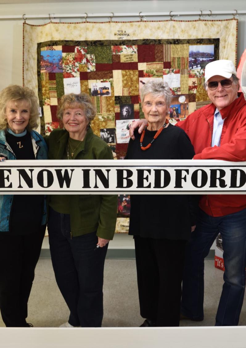 Cast members from It's a Wonderful Life movie posing in Seneca Falls