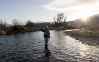 Spend a beautiful winter evening fly fishing on the Provo River