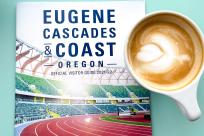 Eugene cover of visitor guide with a latte.