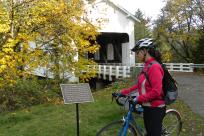 Covered Bridges Scenic Bikeway Sign in Fall by Natalie Inouye