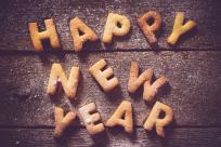 Cookies spelling out happy new year.