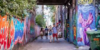 Graffiti Alley is a stretch of  back-alley between Spadina and Portland Street full of legalized colourful street art murals