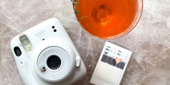 A Polaroid camera and cocktail at the Four Seasons Hotel Toronto