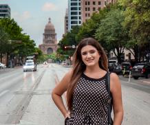 Dana Perez of Visit Austin in front of the state Capitol
