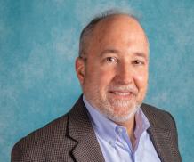 Man's corporate headshot.
