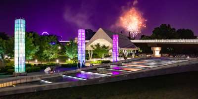 Art installations and fireworks in the night sky at Big Four Station Park in Jeffersonville