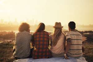 Group-of-friends-hanging-out-admiring-a-sunset-in-Oakland