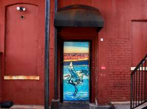 Quivera Sunset Alley Door by Marcia Scurfield