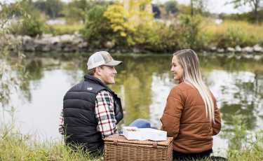 Couple Has A Picnic At Asylum Point Park And Lighthouse In Oshkosh