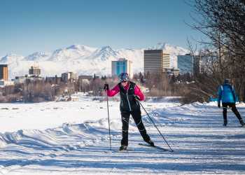 Skiers on the Coastal Trail near downtown Anchorage.