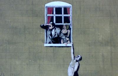 Banksy's 'Well Hung Lover' on Park Street, central Bristol