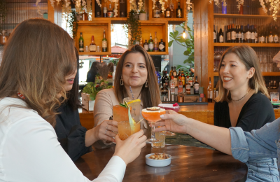 Women with cocktails at Coal Kitchen in Cabot Circus Bristol - credit Coal Kitchen