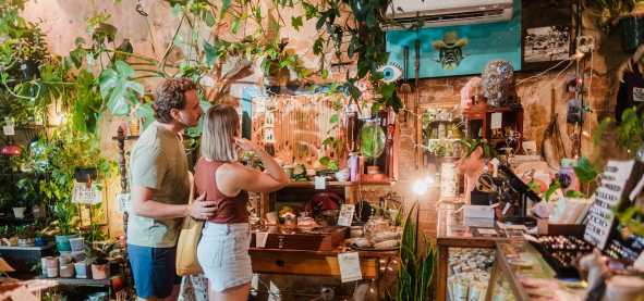 A couple shops at Daughter of the Wild in Downtown San Marcos