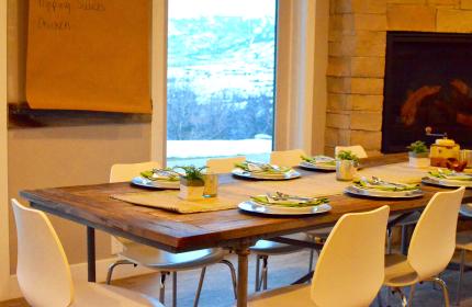 a beautiful table setting with stunning views of the mountains