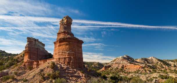 photo looking up at the lighthouse rock formation in palo duro canyon in the afternoon