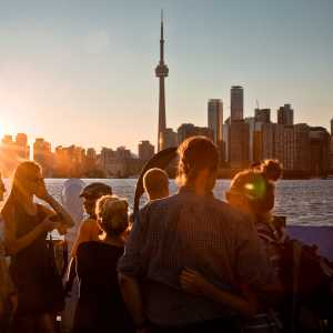 A sunset view of the Toronto skyline from the Centre Island ferry