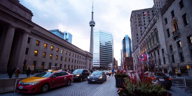 Cars on Front Street outside Union Station in downtown Toronto