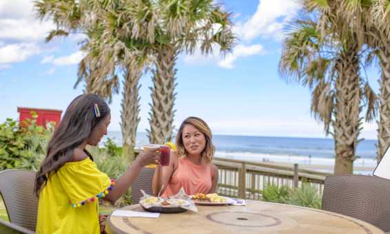 Two women oceanfront dining in Daytona Beach