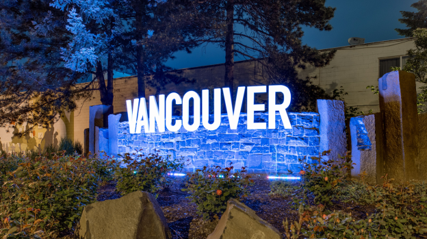 Vancouver Gateway sign lit up purple