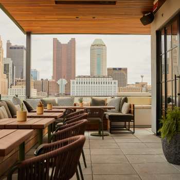A view of the Columbus skyline from The Brass Eye, a rooftop bar at The Junto