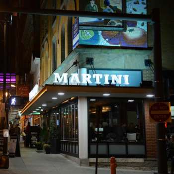 Martini sign on North High Street at night