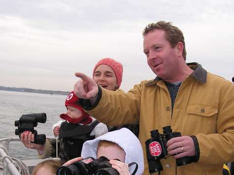 Family on Save The Bay Seal Watch Cruise (tour in Newport, photo can also represent Westerly cruises).