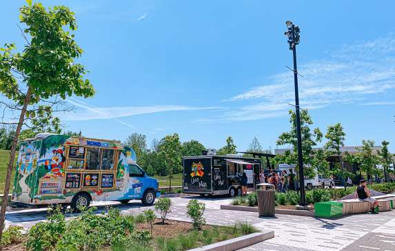 Food trucks lined up at Switchyard Park for Food Truck Friday