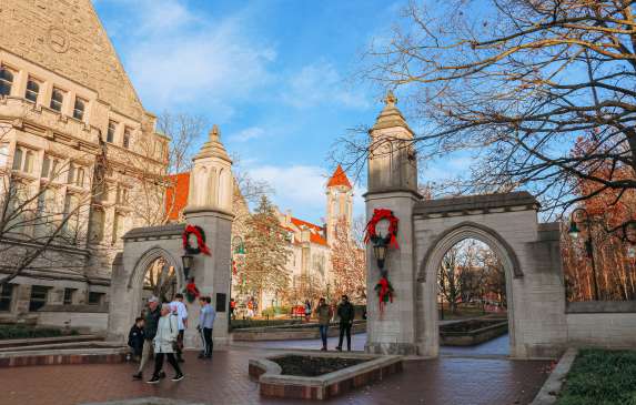 People walking through Sample Gates during a winter day