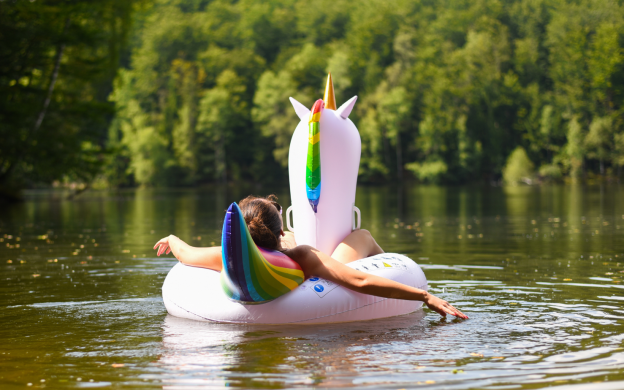 Women Floating on Lake