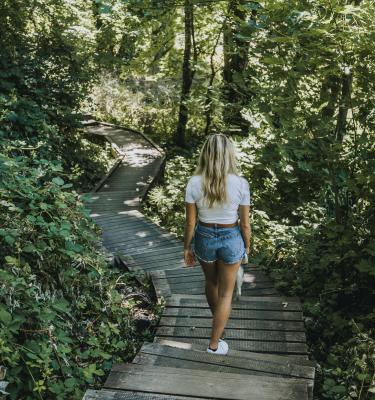 Girl walking at Columbia Springs