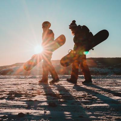Two snowboarders at Hogadon Basin on Casper Mountain shot by David Kerr