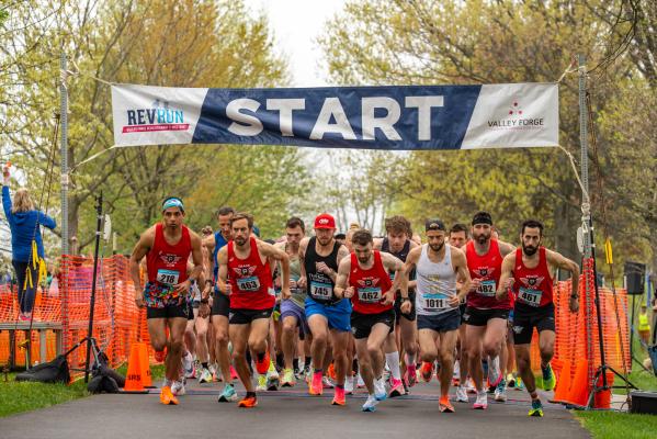 Runners begin the race at the 2023 Rev Run