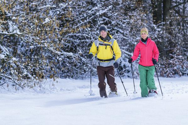 Couple snowshoeing