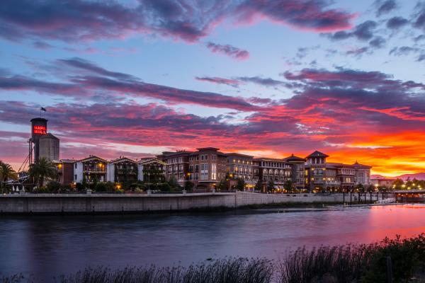 A bold sunset paints the sky over the Napa River