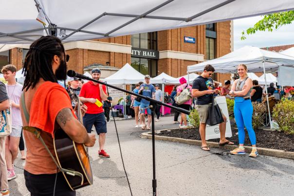 Musician plays at sunday on strawberry