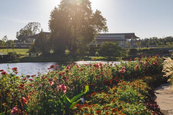 Longhouse Visitor's Center shines in the sunlight at the Overland Park Arboretum & Botanical Gardens.