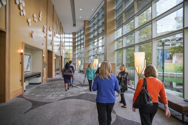 Business group walking down corridor at The Westin Hotel