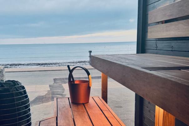 Inside Swanage Bay Sauna with views of Swanage Beach