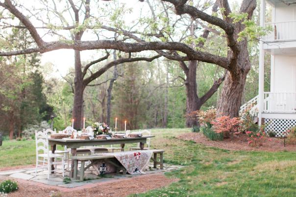 Picnic table set up for wedding on farm