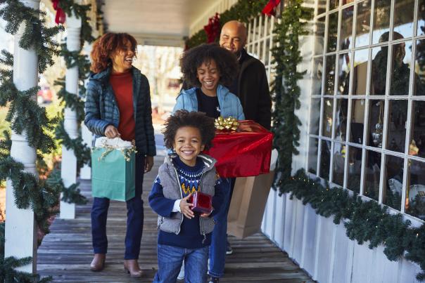 Family with Christmas presents