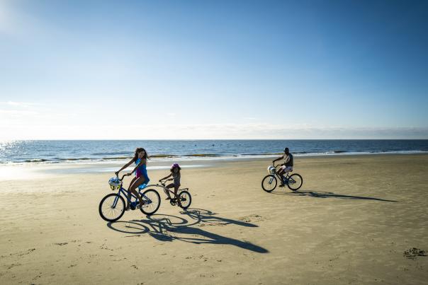 The hard packed sands on St. Simons Island's East Beach makes it perfect for riding bikes.