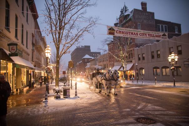 A horse drawn carriage makes it way up Main Street Bethlehem at Christmas