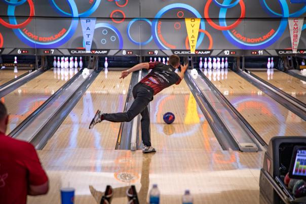 Competitive bowler mid-throw