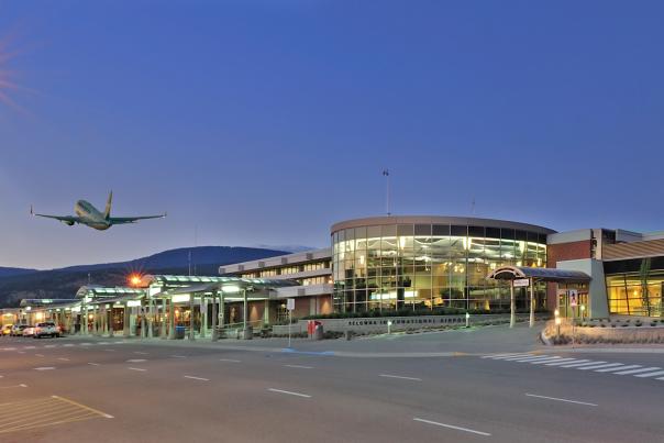 Kelowna International Airport at Dusk with Airplane taking off